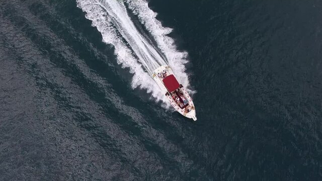 Motor boat sail along the Kotor bay. Aerial view
