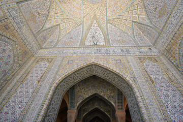 Arches with mosaics at Vakil Mosque in Shiraz (Iran)