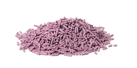 pile of pressed purple cat litter isolated on white background. Granules with lavender scent
