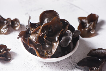 wet black fungus on wood background