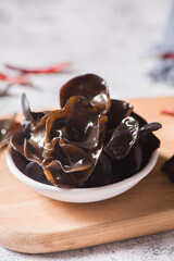wet black fungus on wood background