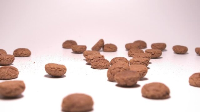 Falling Pepernoten (Dutch treat) in slow motion. Sinterklaas celebration.