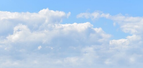 Clouds in the sky all the way to horizon line taken mid day