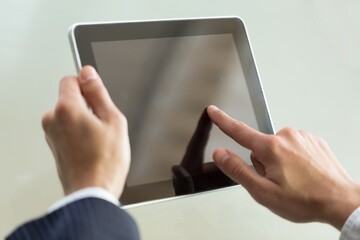 Businessman's Hands Using Digital Tablet