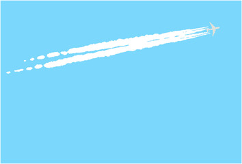 青空に飛行機雲が見える風景