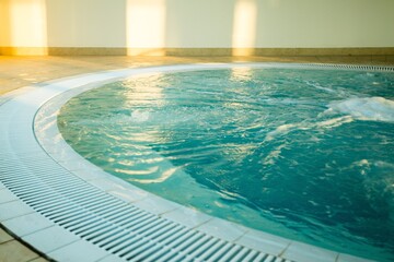 Indoor Whirlpool Bath at the Hotel with blue water