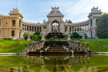 Fototapeta na wymiar External view of Palais Longchamp, fountain and central sculpture group.