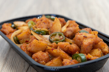 Jalapeno peppers chopped over the pepper seasoned potatoes for a delicious spicy dish.