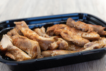 Delicious bowl of broccoli and chicken blended for a specially seasoned Chinese fast food meal.