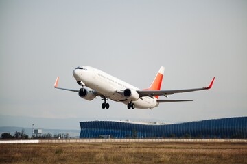 Airplane taking off the runway from the airport