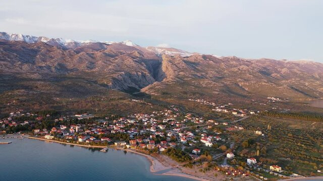Aerial View Of Seline Village With Northern Velebit National Park In Background In Croatia.