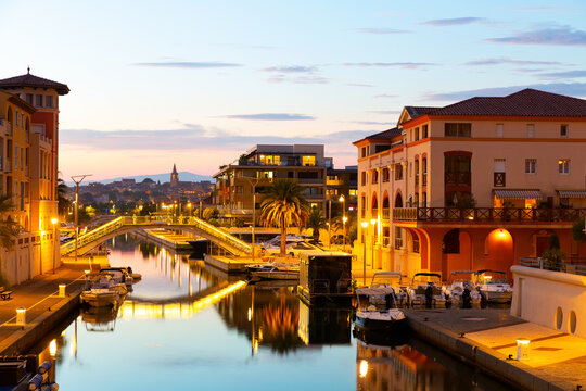 Scenic view of French town of Frejus on Mediterranean coast overlooking residential houses on embankment 