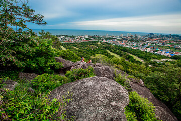 panoramic background of high mountain scenery, overlooking the atmosphere of the sea, trees and...