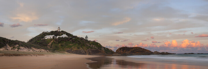 sunset panoramic long exposure shot of sugarloaf point beach and lighthouse at seal rocks in nsw, australia © chris