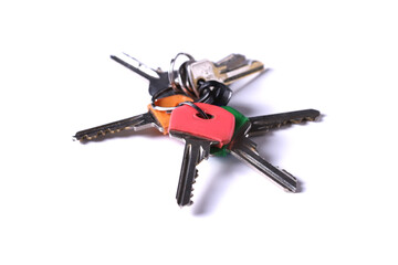 Bunch of keys on white background