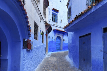 Entrance to the one of the old houses in Medina of Chefchaouen (Chaouen), Morocco. The city is noted for its buildings in shades of blue and that makes Chefchaouen very attractive to visitors.