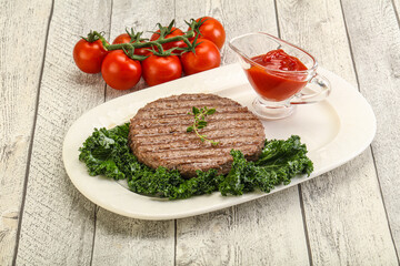 Fototapeta na wymiar Grilled beef cutlet for burger