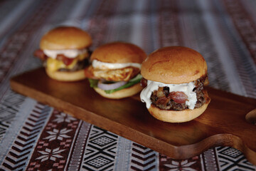 mini burgers uncle Sam, bacon blue,  juicy rooster peri peri