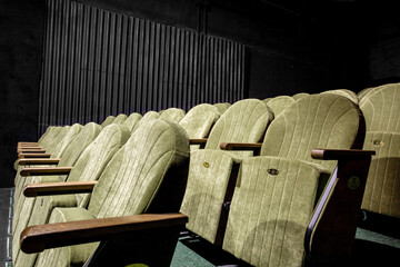 green velvet chairs in the auditorium.