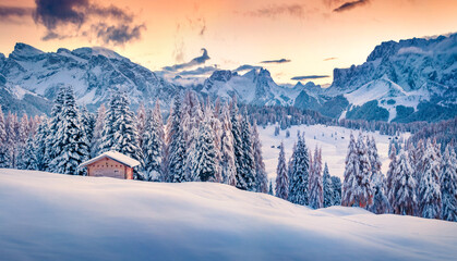 Untouched winter landscape. Adorable morning view of Alpe di Siusi village. Splendid winter scene of Dolomite Alps. Unbelievable sunrise on Ityaly, Europe. Beauty of nature concept background.