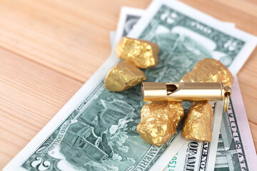 Dollar gold and early warning whistle