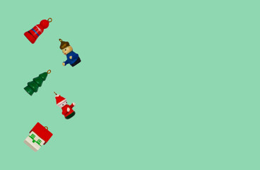 christmas or new year wooden decoration flat lay, eco friendly toys and zero waste concept, miniature small house, man, christmas tree, counting matarial for kids, festive holidays background