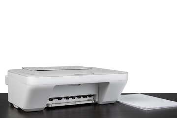 Laser home printer on table against white backgorund
