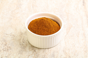 Dry Paprika powder in the bowl