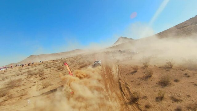 Chasing an off-road truck in a race through the Mojave Desert with a first-person drone