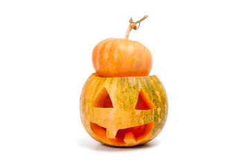 A pumpkin lantern, a Halloween attribute resembling a head with a frightening or funny face, shot against a white background.