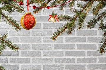 Branches of fir tree with Christmas ornament