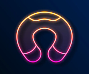 Glowing neon line Travel neck pillow icon isolated on black background. Pillow U-shaped. Vector