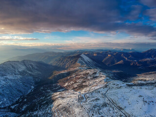 Aerial view of the snowy mountain Taygetus (also known as Taugetus or Taygetos) above Messenia unit in Peloponnese, Greece. Amazing natural scenery of the highest mountain in Peloponnese during winter