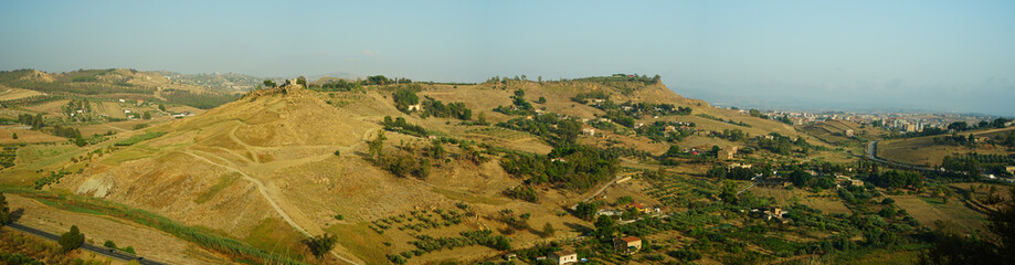 Fototapeta na wymiar Valle dei templi archeological park panoramic view in a summer day, Agrigento, Sicily, Italy