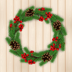 Fototapeta na wymiar Christmas wreath on wooden texture background. 