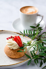 Close-up of Shu cream Japanese cream puff and hot coffee. Concept sweets enjoy eating.