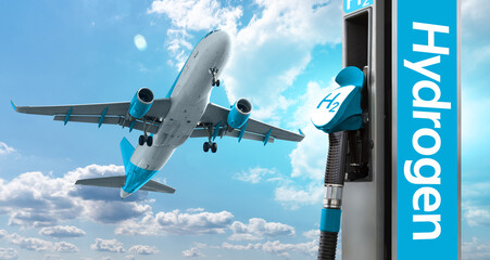 Fuel nozzle with the inscription Hydrogen on a background of airplane and blue sky. Clean mobility...