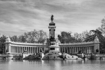 Alfonso XII Monument in Parque del Retiro. Retiro Park, Madrid, Spain. Inaugurated by his son Alfonso XIII in 1922. Front view. Black and white.
