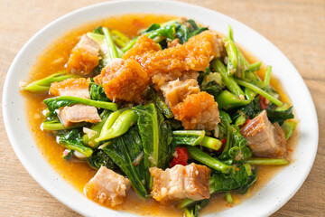 Stir-fried kale vegetable with crispy pork