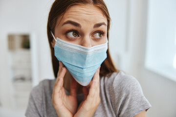 woman patient in medical mask in hospital protection from virus