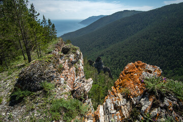 Steep slopes of the Primorsky ridge on the shore of Lake Baikal