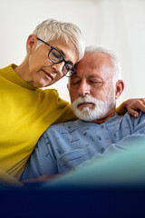 Senior woman with seriously ill husband in hospital. Healthcare support anxiety love concept