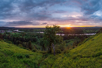 Summer sunset overlooking the river