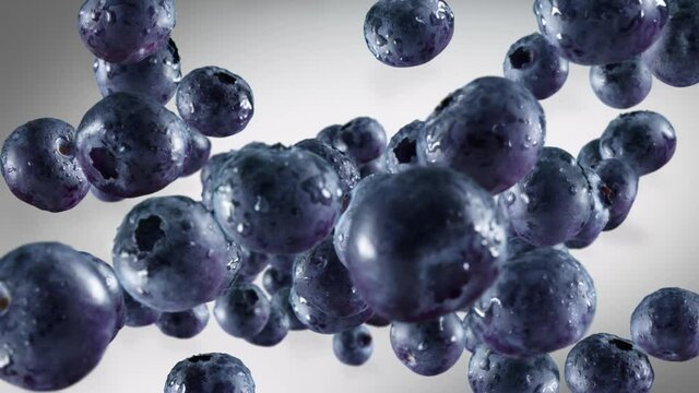 Flying of Blueberries in Dark Grey Background
