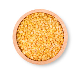 Peeled split mung bean in wooden bowl on white background. Top view