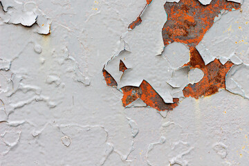 Peeling paint on rusty metal texture