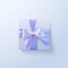 White gift box with pastel purple bow and crossing ribbons isolated on white background.
