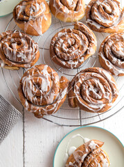 Homemade cinnamon rolls on a cooling rack