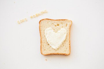 sandwich for breakfast in form of heart with cheese - good morning inscription