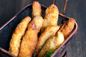 deep-fried chicken pieces cut into long pieces